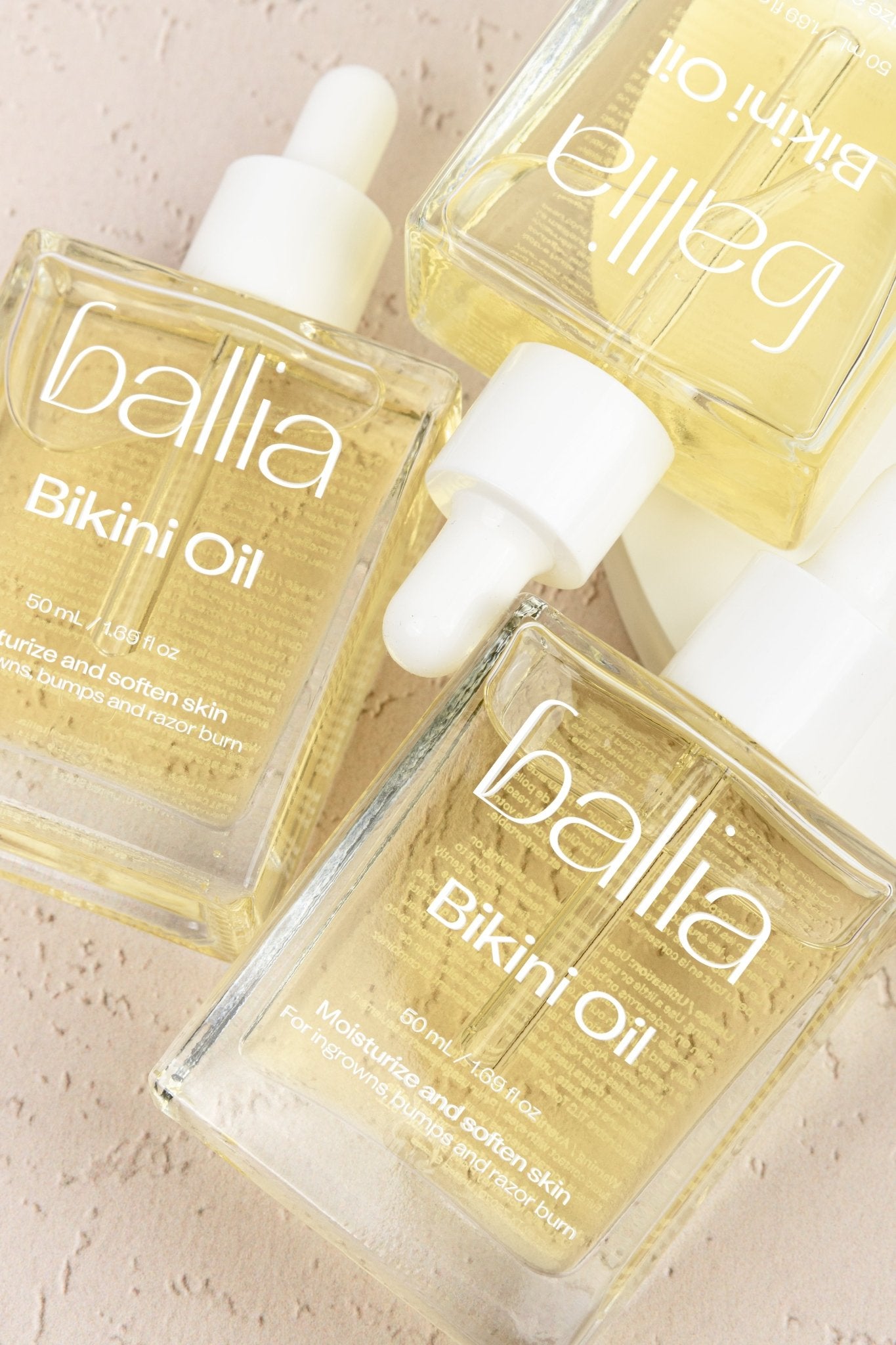 Bikini line aftershave treatment bottle to reduce and prevent ingrown hairs, red bumps, hyperpigmentation and razor burn.